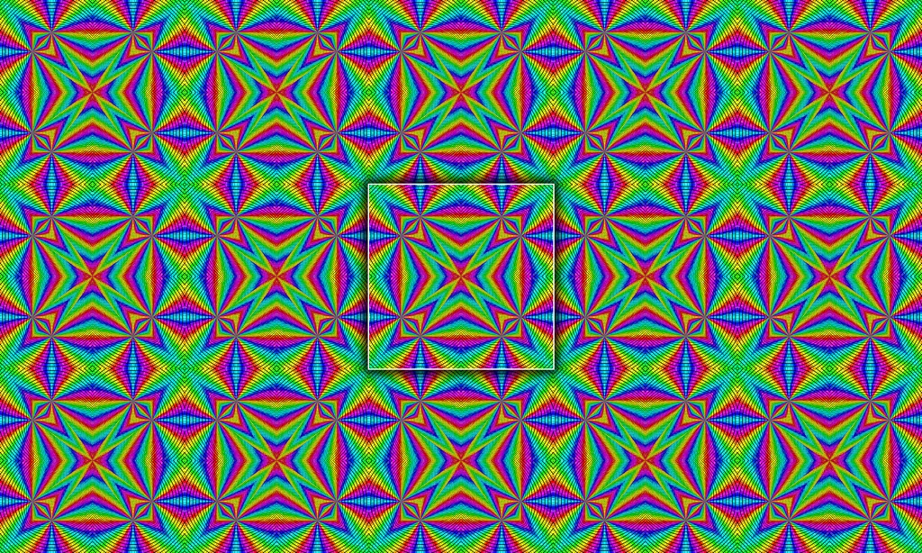 A colorful geometric mosaic kaleidoscope in a mirrored pattern
