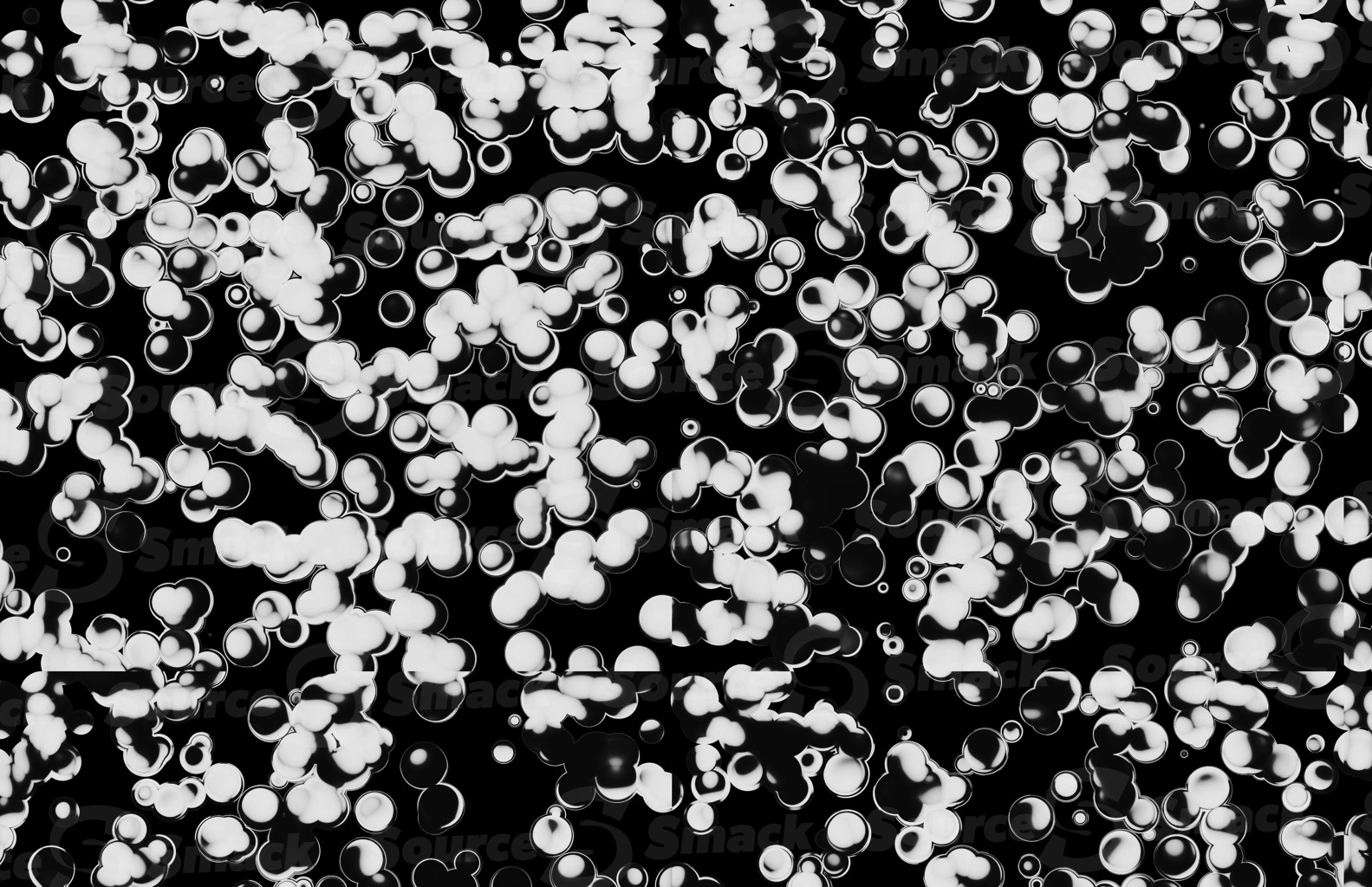 A cluster of black and white marbles