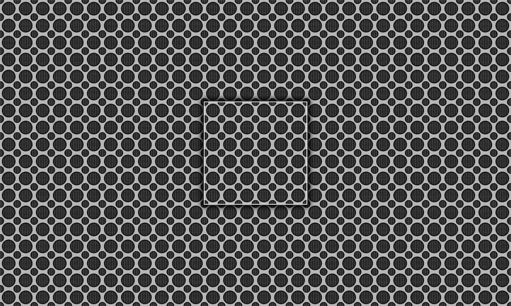 A metal grate plate with circles punched out