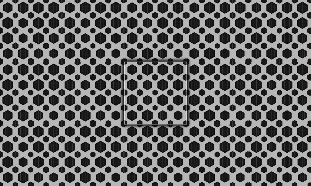 A metal grate plate with a hexagon pattern punched out