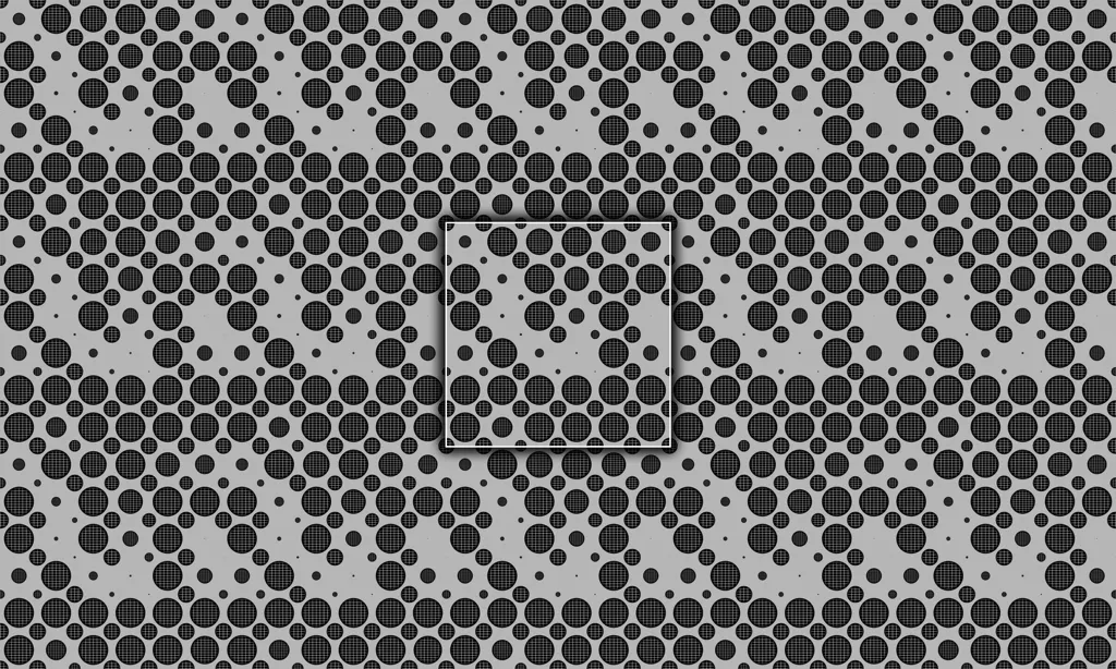A metal grate plate with circles punched out
