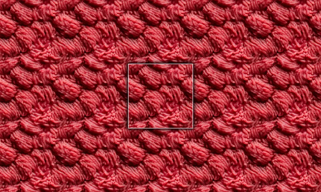 A seamless texture of raw ground beef