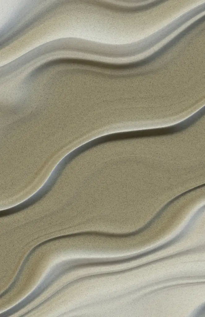 Close up of sea shore sand rippled by wave movements