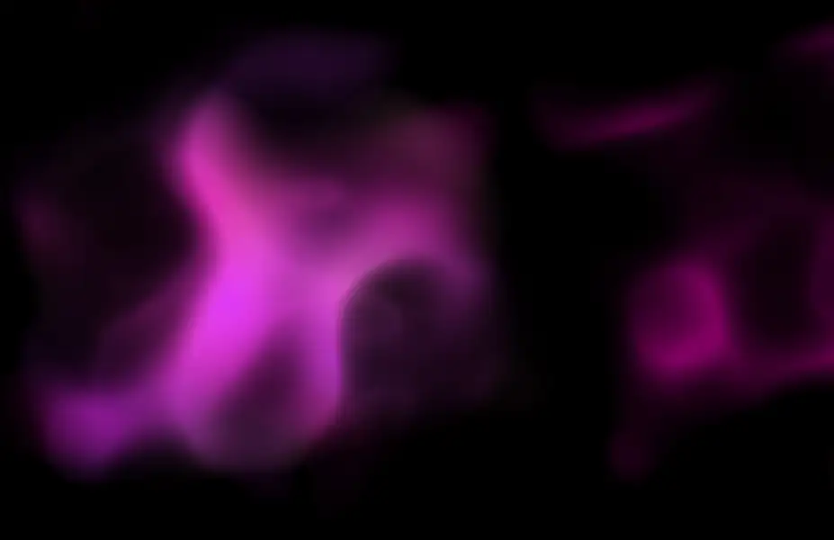 An atmospheric pink gas floating in darkness