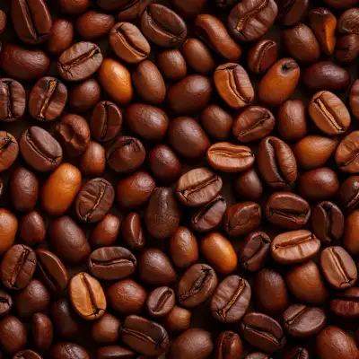 A seamless tile of a pile of roasted coffee beans