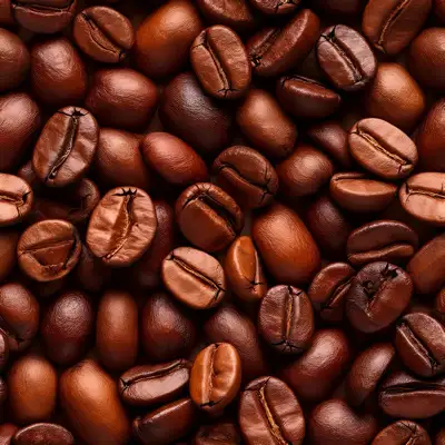 A seamless tile of a pile of roasted coffee beans