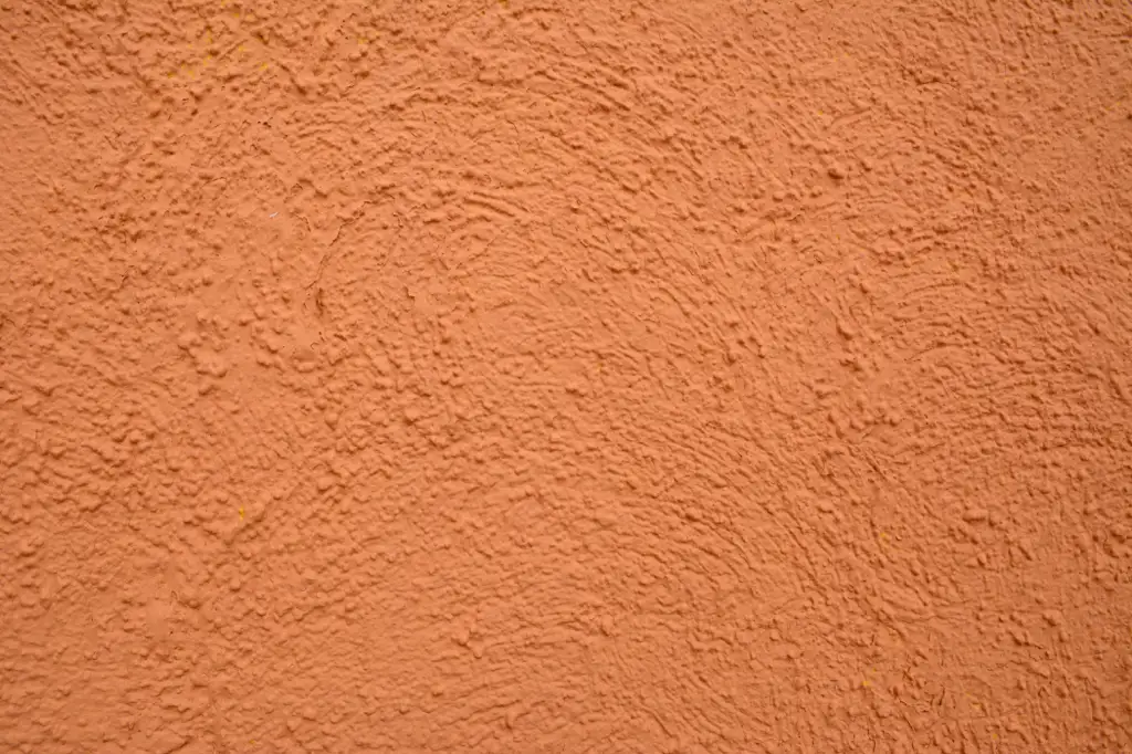 Stucco wall surface Closeup of grains of sand on a beach in Cabo San Lucas