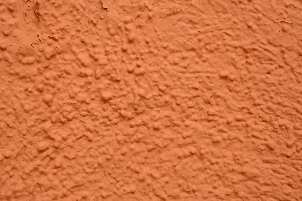Stucco wall surface Closeup of grains of sand on a beach in Cabo San Lucas