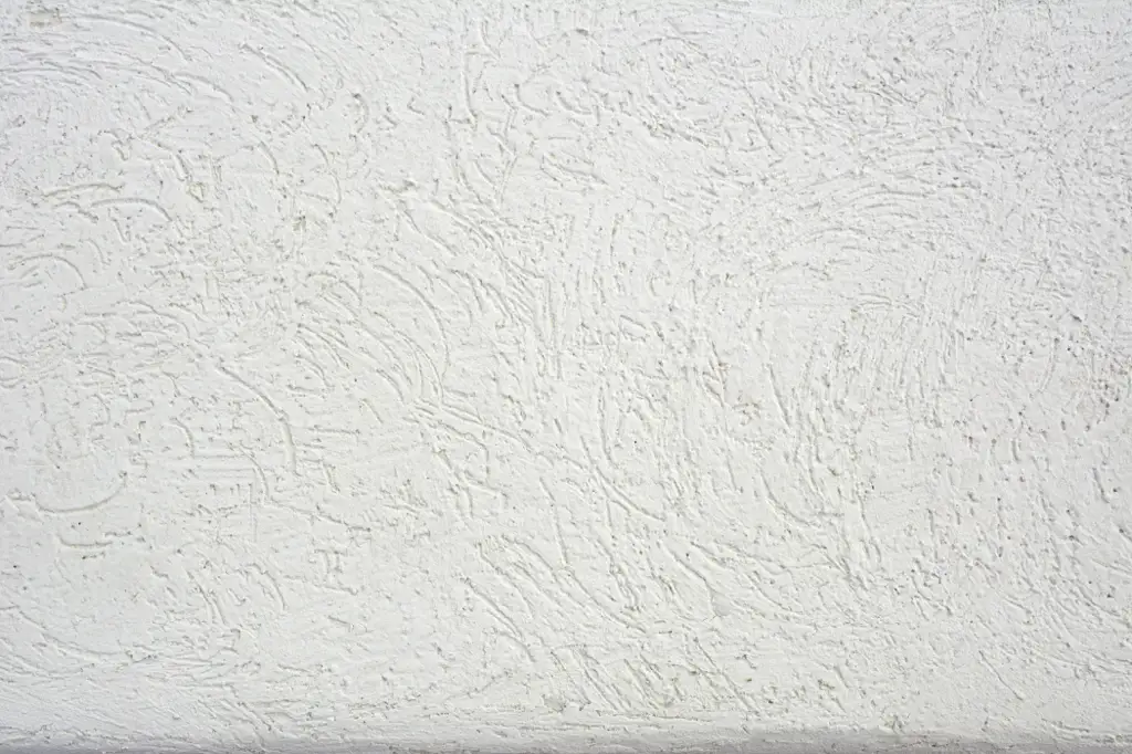 Stucco wall surface Closeup of grains of sand on a beach in Cabo San Lucas