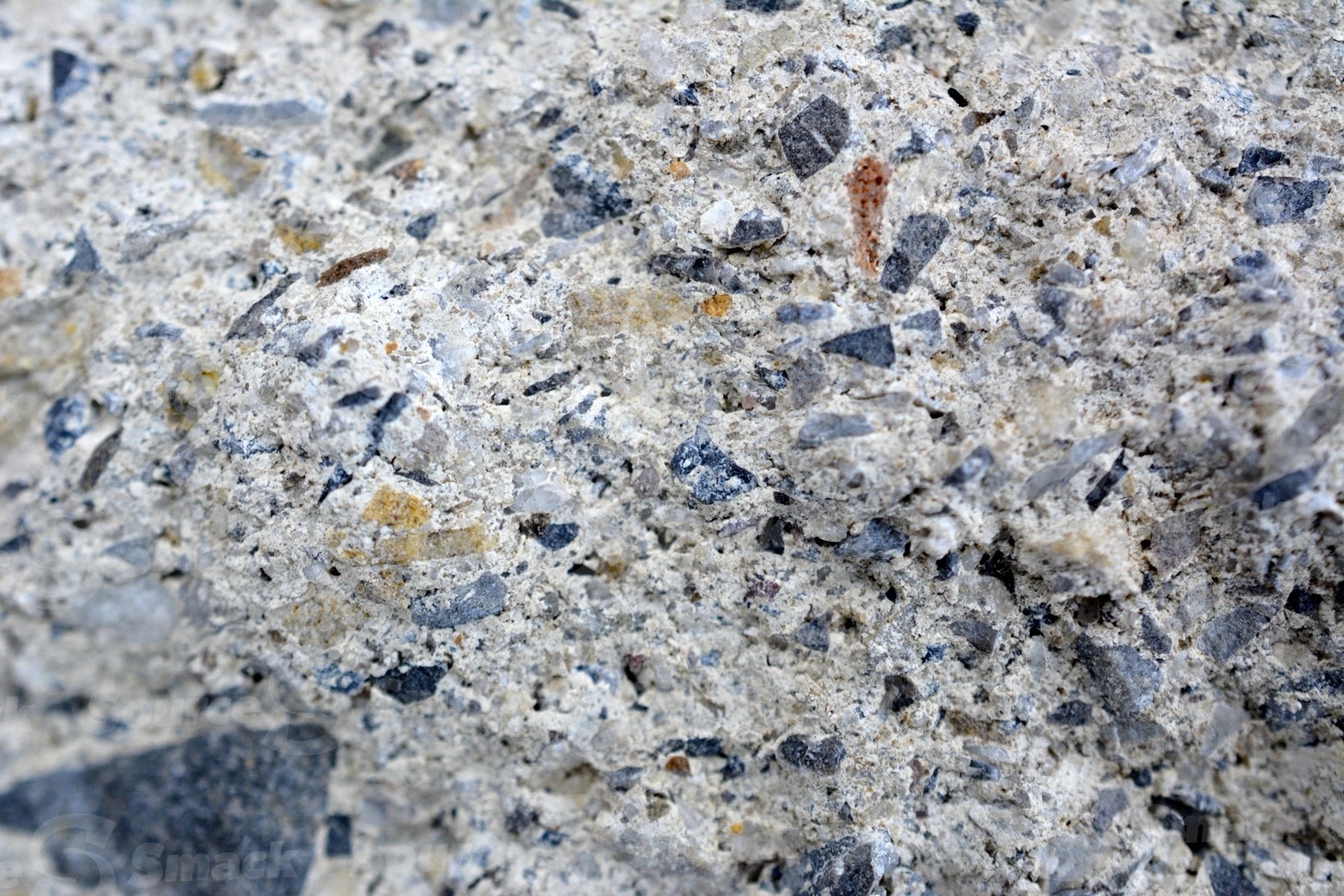 Closeup of stone fragments in cement