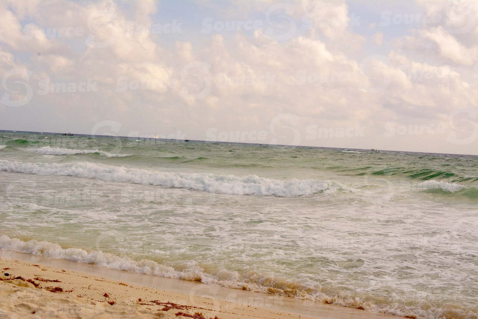 Ocean waves crashing on a beach in Mexico