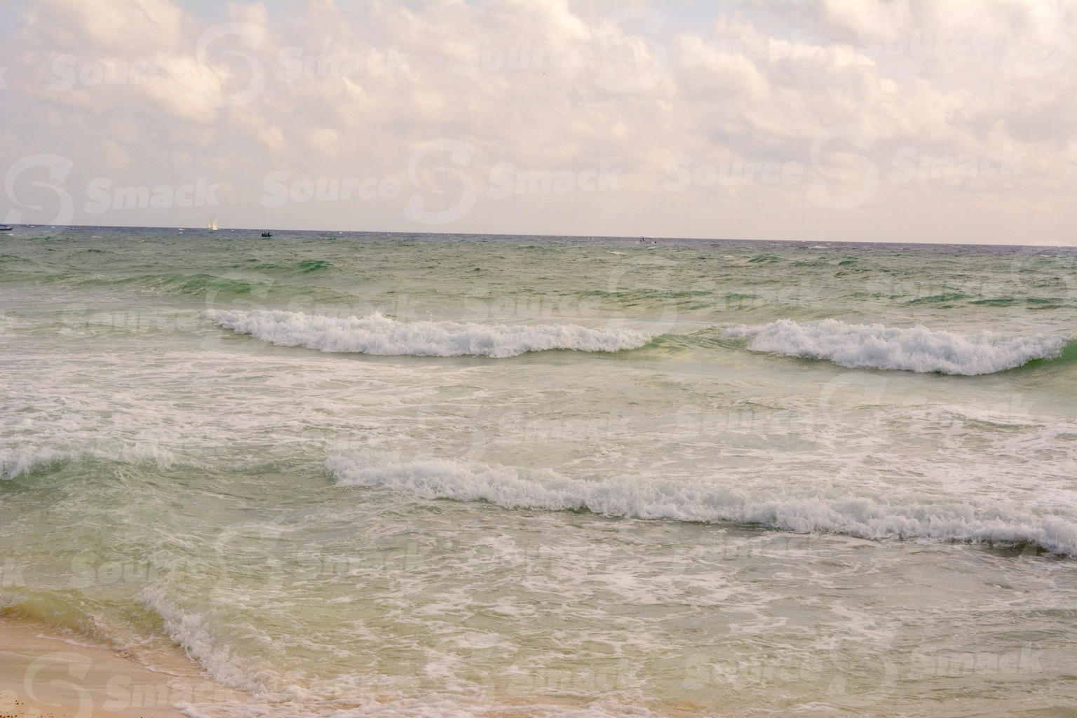 Ocean waves crashing on a beach in Mexico