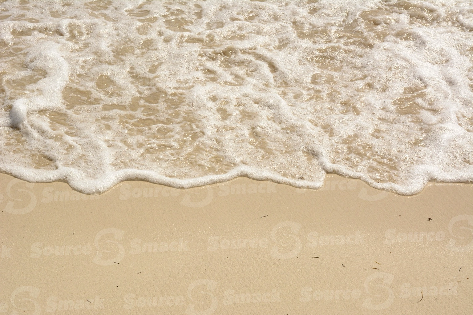 Ocean waves on beach shore in Mexico