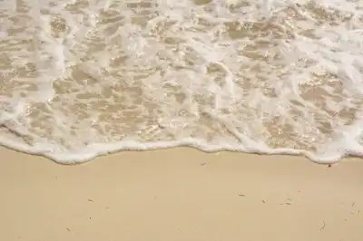 Ocean waves on beach shore in Mexico